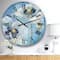 Designart 'Handpainted White Flower On Blue I Farmhouse Wall Clock